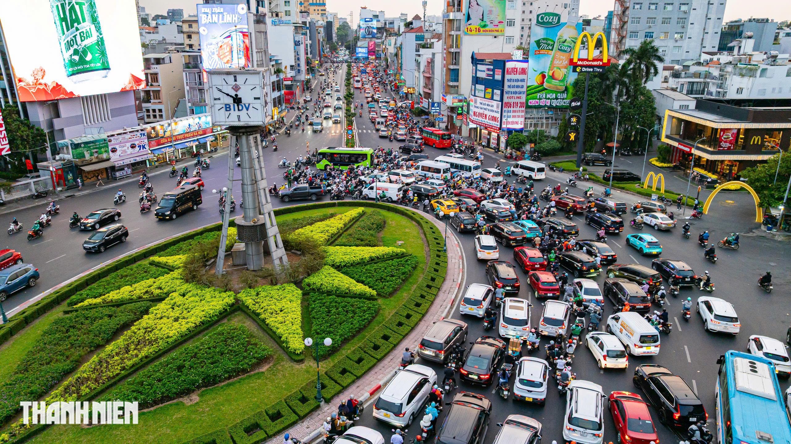 TP.HCM thí điểm bỏ chạy vòng xuyến ở vòng xoay Nguyễn Bỉnh Khiêm từ 23.5- Ảnh 1.
