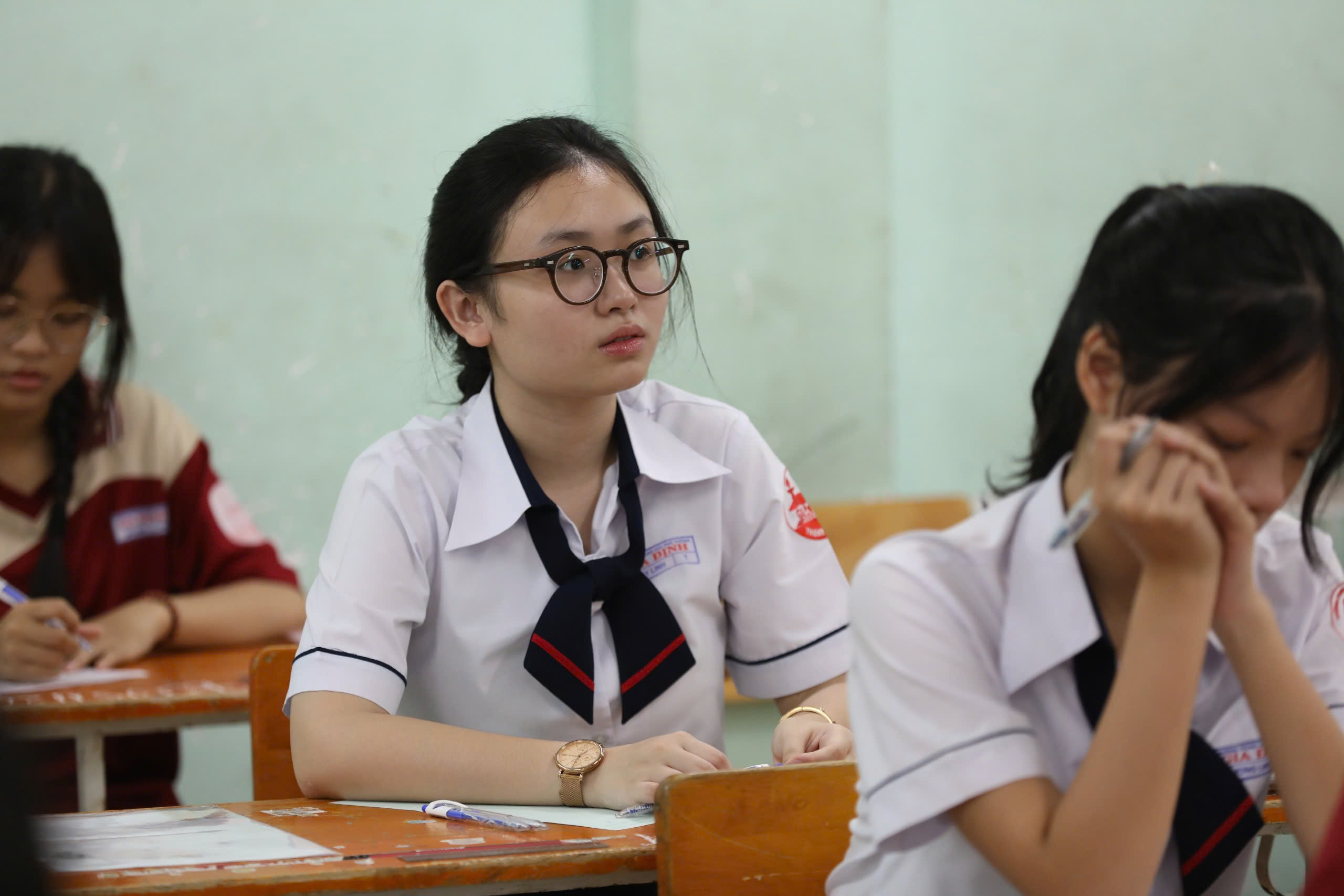 Chấm văn thi tốt nghiệp THPT theo rubric: Chuyển từ "đếm ý" sang đánh giá mức độ Chấm văn thi tốt nghiệp THPT theo rubric: Chuyển từ 'đếm ý' sang đánh giá mức độ - Ảnh 2.