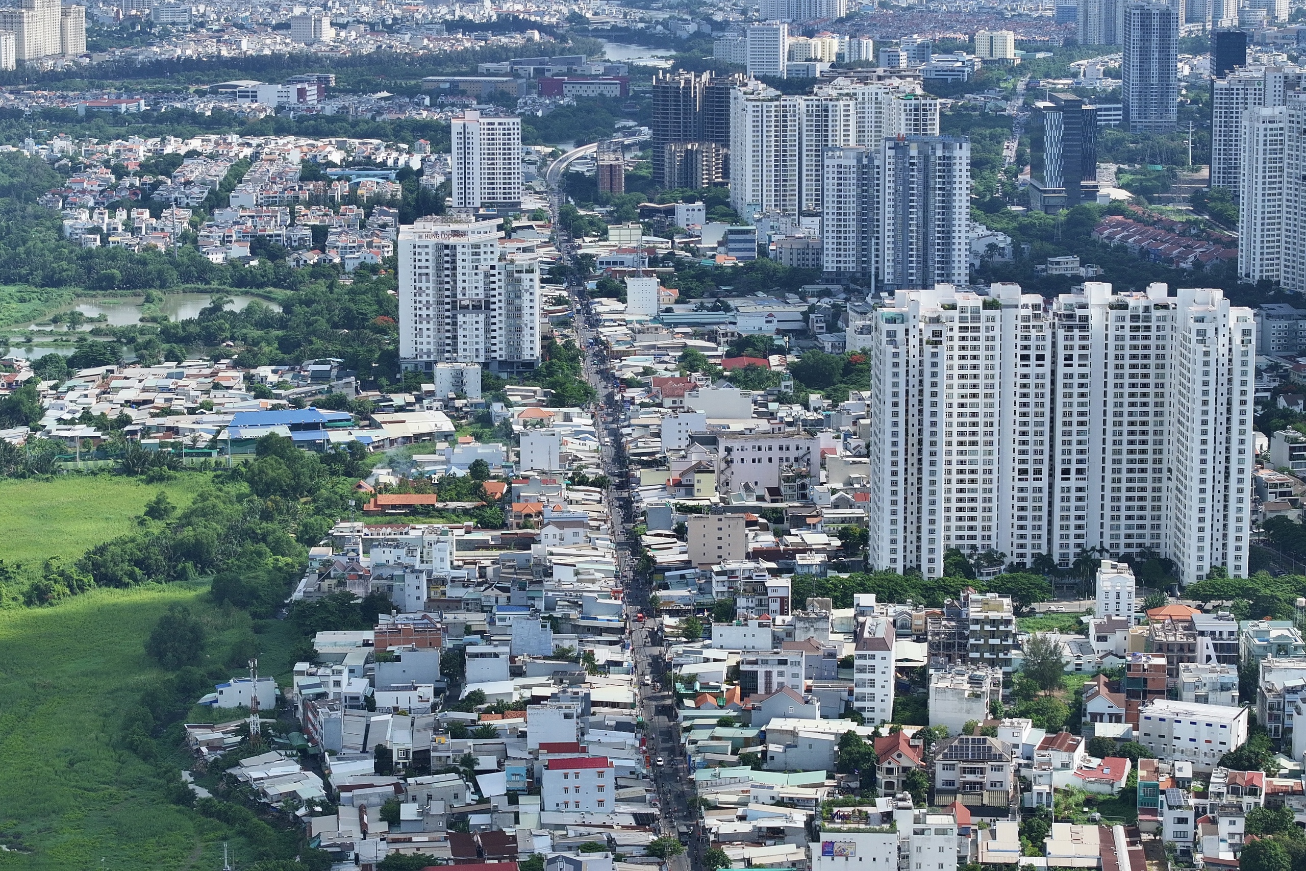 Đường Lê Văn Lương hơn 10 km ở TP.HCM sẽ mở rộng gấp 6 lần?- Ảnh 1.
