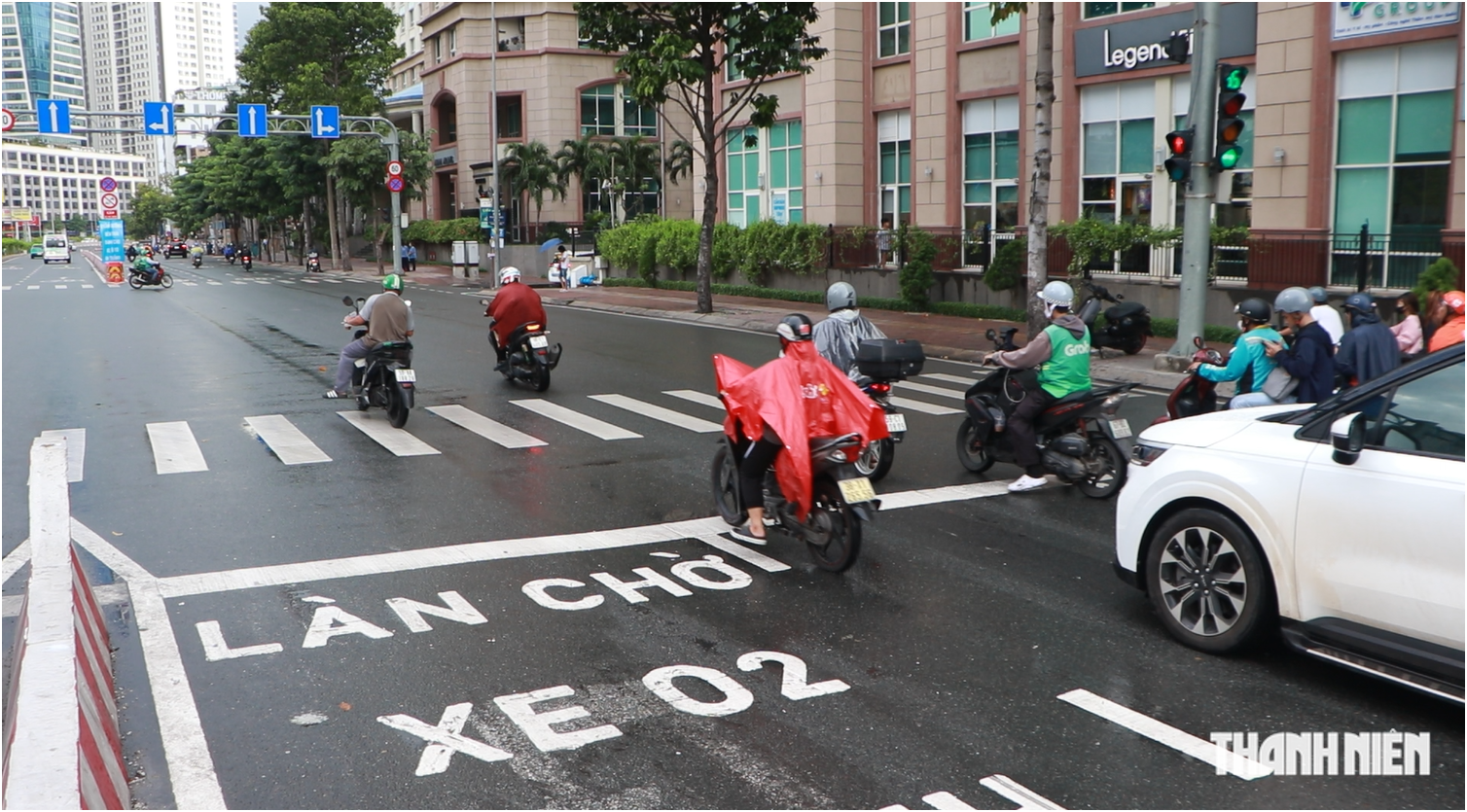 Người dân nói gì sau một tuần phân làn trên đường Nguyễn Hữu Cảnh? - Ảnh 3.