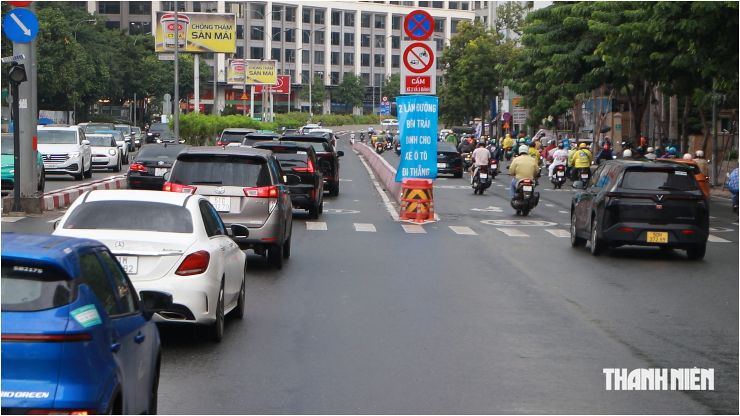 Người dân nói gì sau một tuần phân làn trên đường Nguyễn Hữu Cảnh? - Ảnh 2.