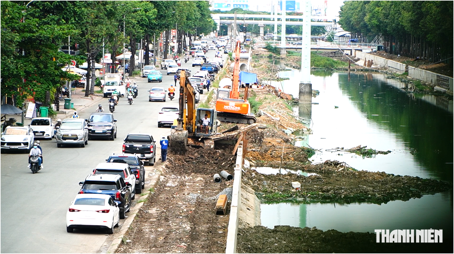 Từng phải 'bịt mũi, nín thở' khi đi qua, người dân mong chờ ngày rạch Đá Đỏ - Ảnh 1.