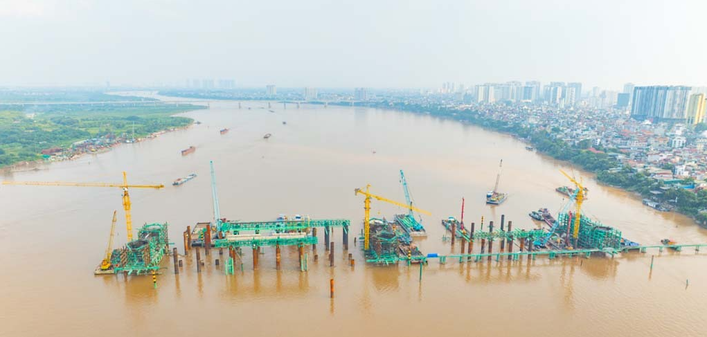 Cầu Trần Hưng Đạo tiến độ 'thần tốc', dựng vòm thép chỉ sau 8 tháng khởi công - Ảnh 2.