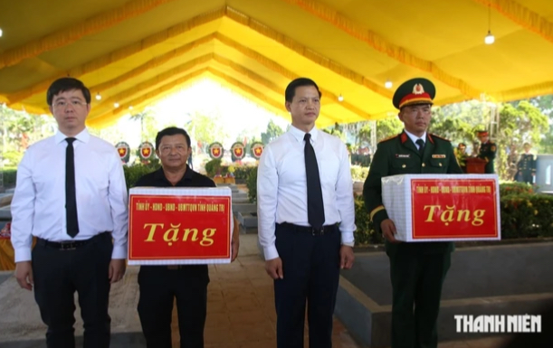 An táng 30 hài cốt liệt sĩ vừa tìm thấy ở Quảng Trị- Ảnh 4.