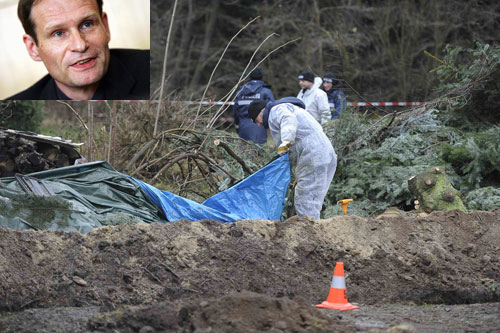 Khám xét nơi chôn thi thể nạn nhân trong khu đất của Detlev G - Ảnh: Reuters