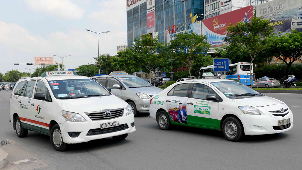 Giá cước GrabCar đã bằng với taxi truyền thống - Ảnh: D.Đ.Minh