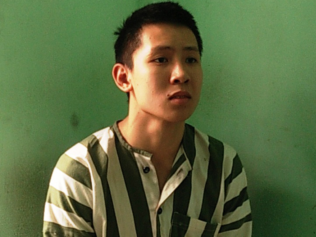 Minh bị bắt tại công an - Ảnh: Công Nguyên