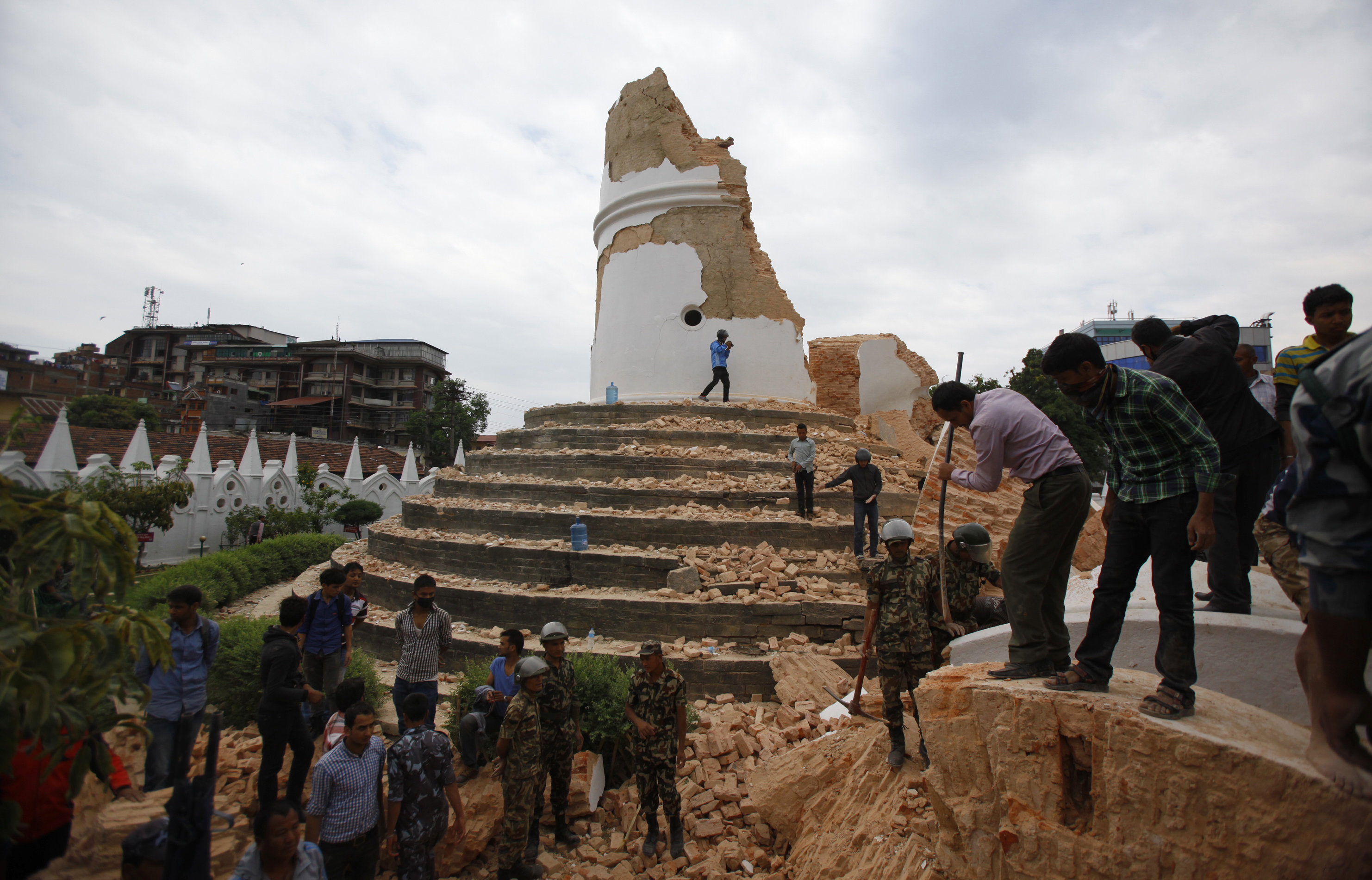 Volunteers-work-to-remove-debris-at the-historic-Dharahara-Tower-in-Kathmandu-Nepal