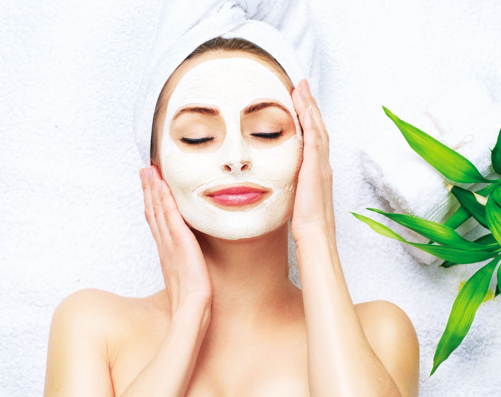 stock-photo-spa-woman-applying-facial-cleansing-mask-beauty-treatments-clay-mask-304359080-1