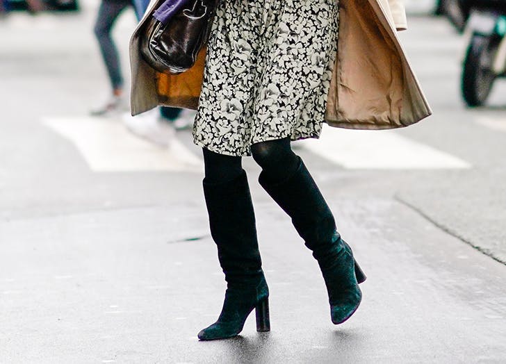 woman-wearing-a-dress-and-tall-boots