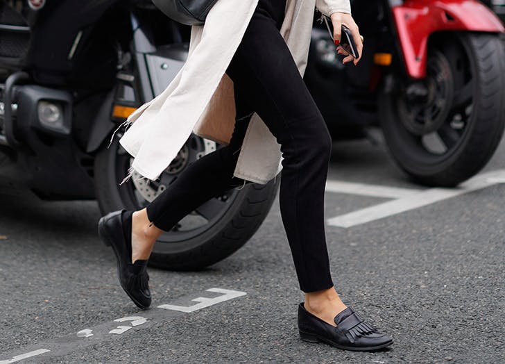 woman-wearing-black-pants-and-loafers-
