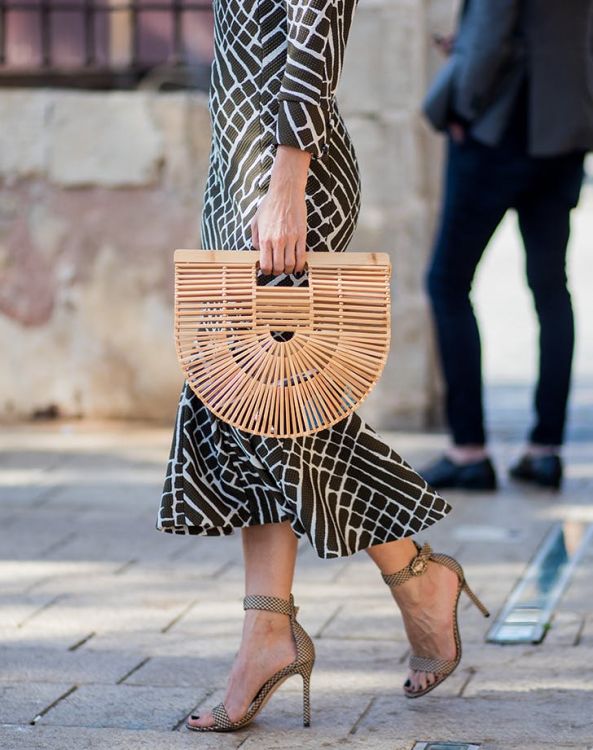 structured wooden basket bags are no longer trending