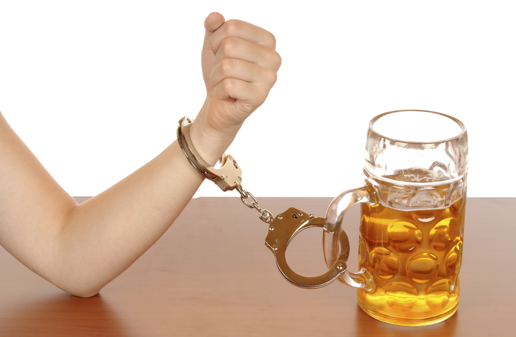 women handcuffed to alcohol drink