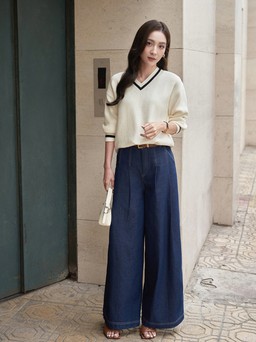 Từ văn phòng đến tiệc tối, quần jeans xanh đen vẫn cuốn hút