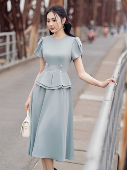 Áo peplum định nghĩa lại vẻ đoan trang trong thời trang công sở hiện đại