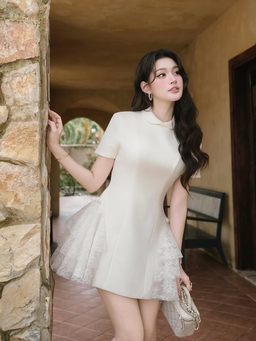 Bí quyết 'siết' vòng 2 thon gọn với váy chiết eo