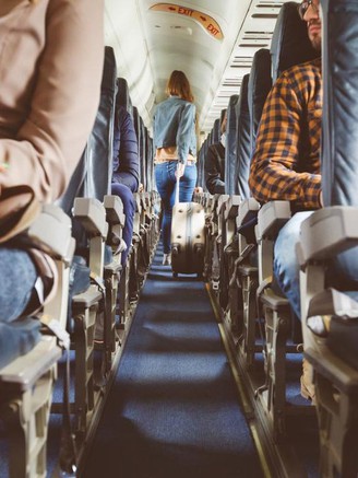 Vì sao hành khách phải ngồi đúng chỗ trên máy bay?