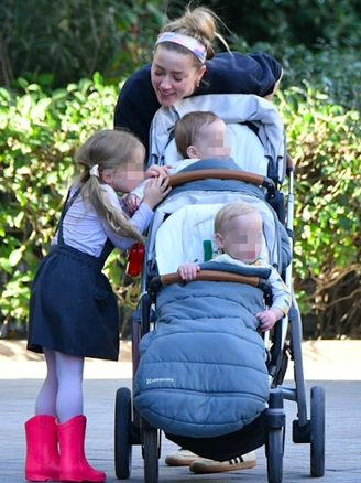 Amber Heard lui về ở ẩn cùng 3 con sau sóng gió
