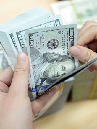 Giá USD hạ nhiệt, vàng mất sức hút