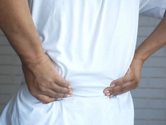 Đau lưng kéo dài, khi nào là do khối u cột sống?- Ảnh 1.