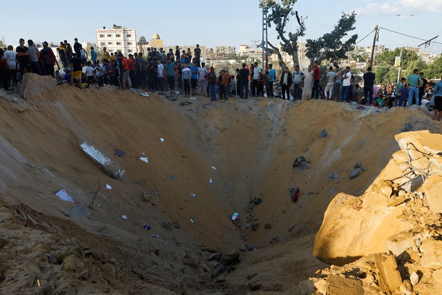 Cuộc sống của người dân ở Gaza qua ảnh lúc xung đột Hamas-Israel tiếp diễn - Ảnh 4.