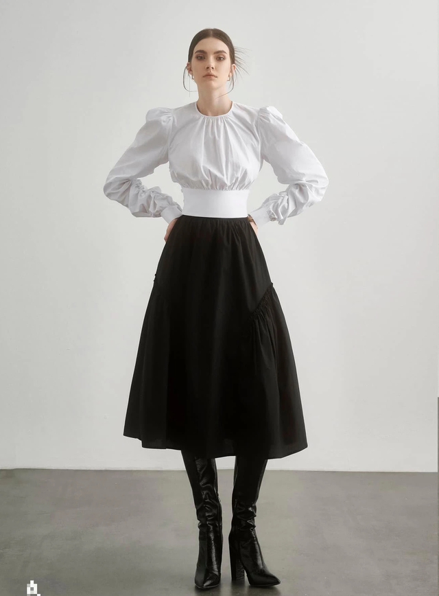 Sức hút từ vẻ đẹp tinh tế tối giản của trang phục mang sắc đen trắng - Ảnh 1.