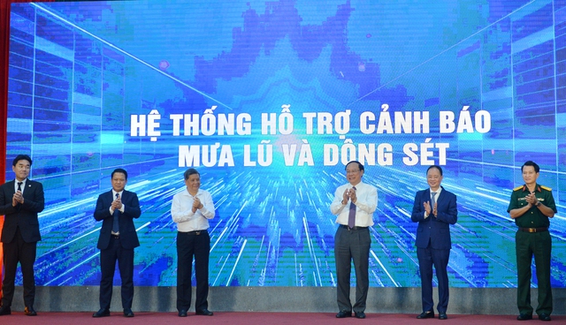 Tổng Cục khí tượng thủy văn ra mắt hệ thống cảnh báo sớm giông, sét, mưa lũ - Ảnh 1.