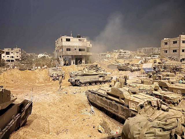 Israel không kích Gaza, đối phó hỏa lực từ nhiều hướng - Ảnh 1.