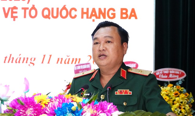 Báo Quân khu 7 nhận Huân chương Bảo vệ tổ quốc hạng Ba - Ảnh 3.