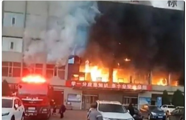 Cháy tòa nhà văn phòng ở Trung Quốc, 26 người chết - Ảnh 1.