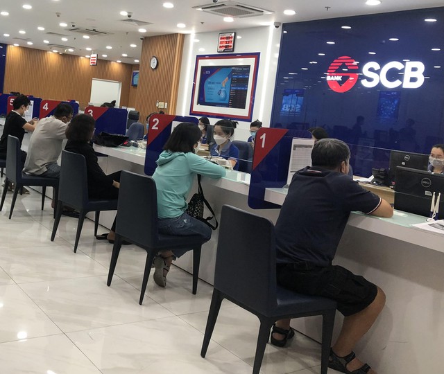 SCB giảm lãi suất tiết kiệm, cảnh báo giả mạo lừa đảo- Ảnh 1.