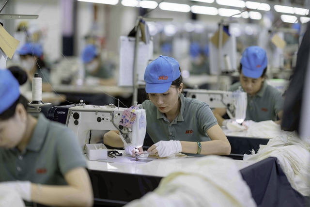 Hơn 50% sản phẩm của các cửa hàng Uniqlo Việt Nam là 'Made in Vietnam' - Ảnh 1.