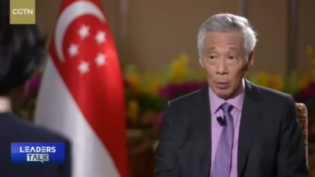 Thủ tướng Singapore bị giả mạo video quảng bá tiền ảo- Ảnh 1.