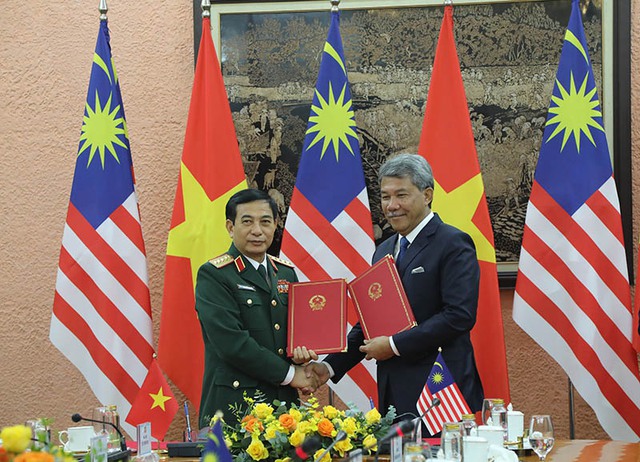 Việt Nam và Malaysia ký Bản ghi nhớ về hợp tác quốc phòng song phương - Ảnh 1.