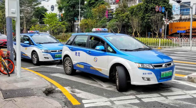 Nhiều tài xế taxi trên thế giới chuyển sang dùng xe điện   - Ảnh 2.