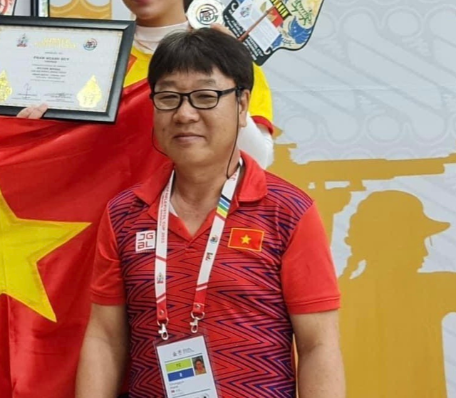 Thầy của nhà vô địch Olympic Hoàng Xuân Vinh bị chậm lương - Ảnh 1.