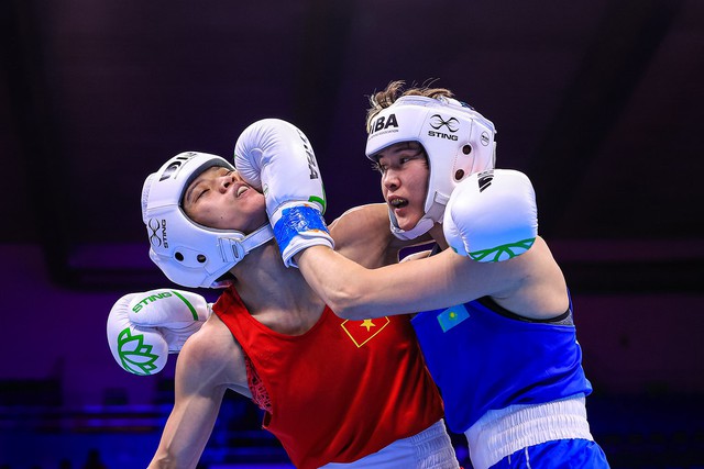 Võ sĩ Nguyễn Thị Tâm hạ tuyệt đối cựu vô địch boxing thế giới - Ảnh 1.