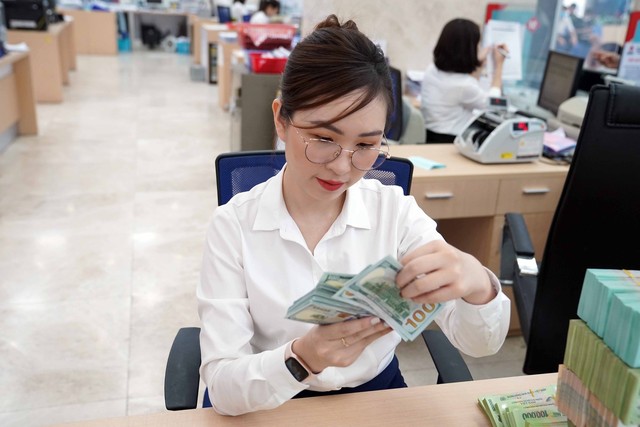 Giá USD ngày 3.3.2023: Tiếp tục đi xuống - Ảnh 1.