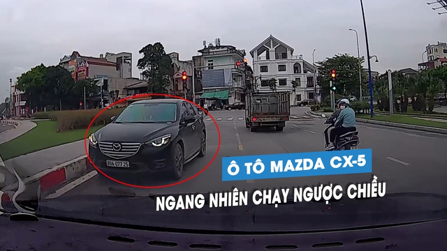 Ô tô Mazda CX-5 thản nhiên bật xi-nhan để chạy ngược chiều trên phố - Ảnh 2.