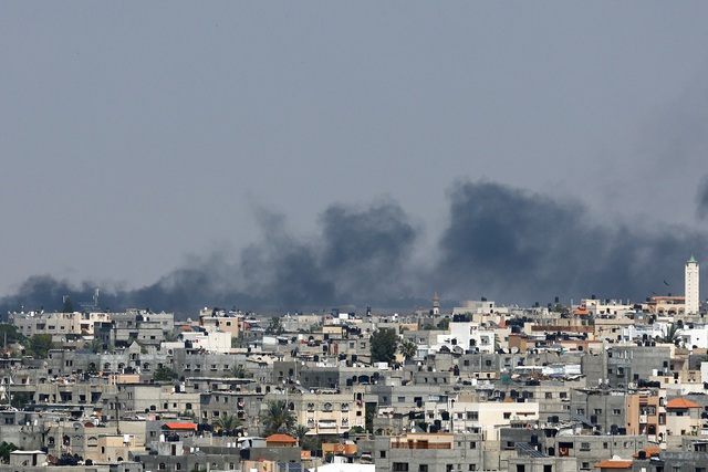 Ngừng bắn có hiệu lực ở Gaza sau 5 ngày giao tranh - Ảnh 1.