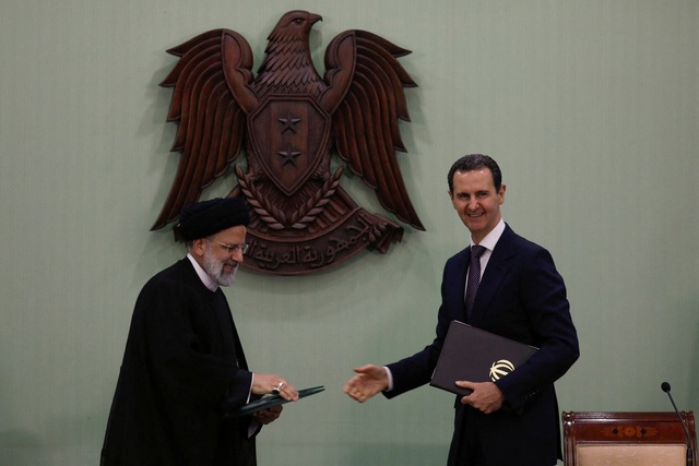 Tổng thống Iran lần đầu thăm Syria sau 12 năm nội chiến - Ảnh 1.