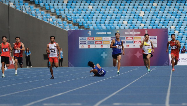 Kỷ lục gia điền kinh SEA Games nội dung 200 m bị té ngã và bỏ cuộc - Ảnh 2.