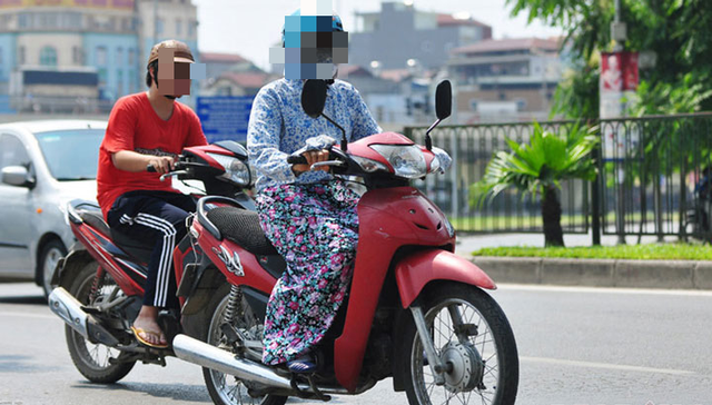 Quảng Ninh: Người phụ nữ nhập viện do áo chống nắng quấn vào bánh xe  - Ảnh 1.