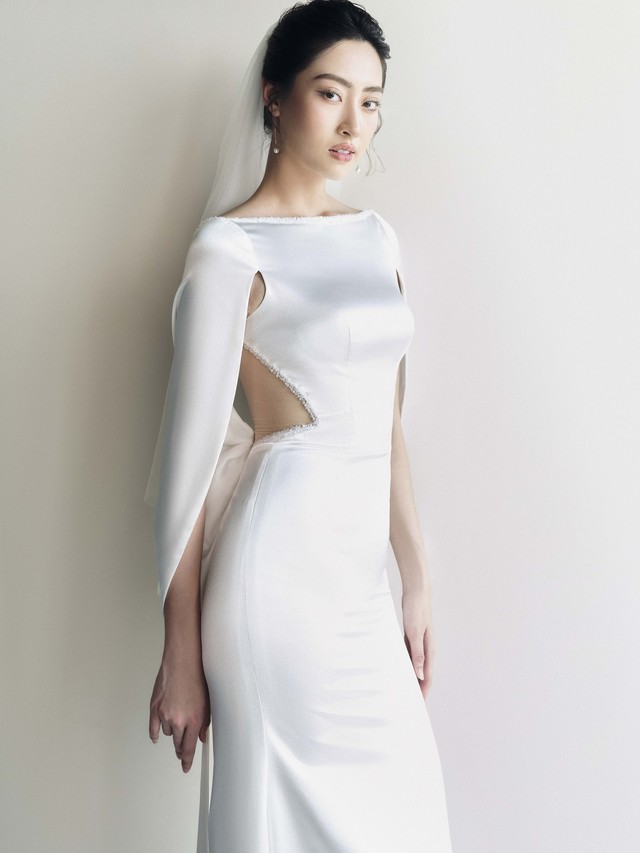 Hoa hậu Lương Thùy Linh lăng xê váy cưới hở vai    - Ảnh 2.