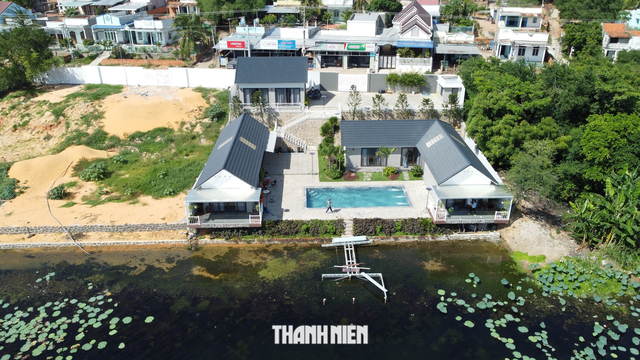 Bình Thuận: Yêu cầu phá dỡ khách sạn xây trái phép lấn hồ ở Bàu Trắng - Ảnh 1.
