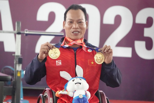 Lê Văn Công xuất sắc giành 2 HCV ở ASEAN Para Games - Ảnh 1.