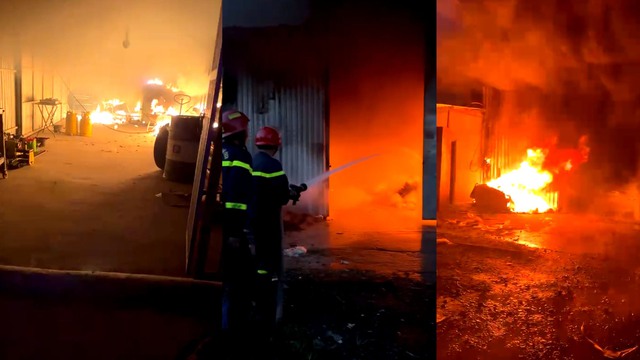 Cứu 4 người trong đám cháy tại hai công ty ở H.Bình Chánh - Ảnh 1.