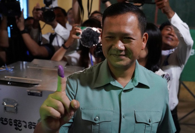 Đảng cầm quyền Campuchia tuyên bố thắng áp đảo - Ảnh 1.