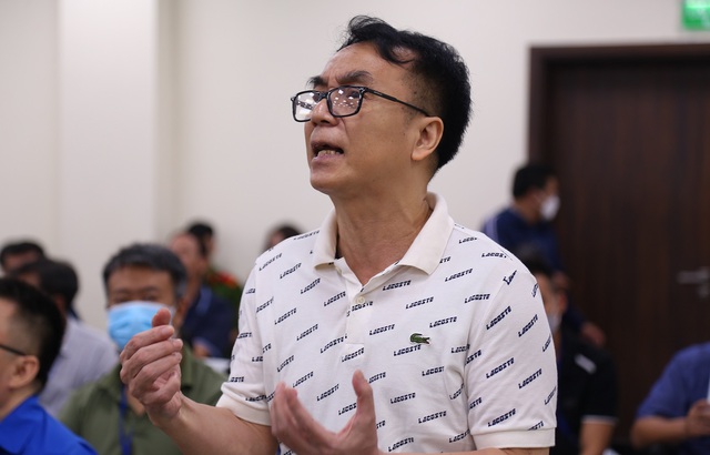 Ông Trần Hùng bị tuyên phạt 9 năm tù về tội nhận hối lộ - Ảnh 1.