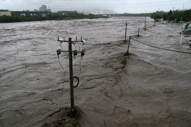 Số người chết tăng lên ở Bắc Kinh, tỉnh phụ cận do siêu bão Doksuri - Ảnh 7.